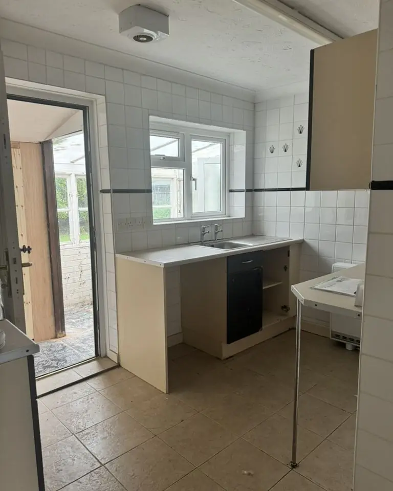 Dated social housing kitchen before replacement, Peterborough